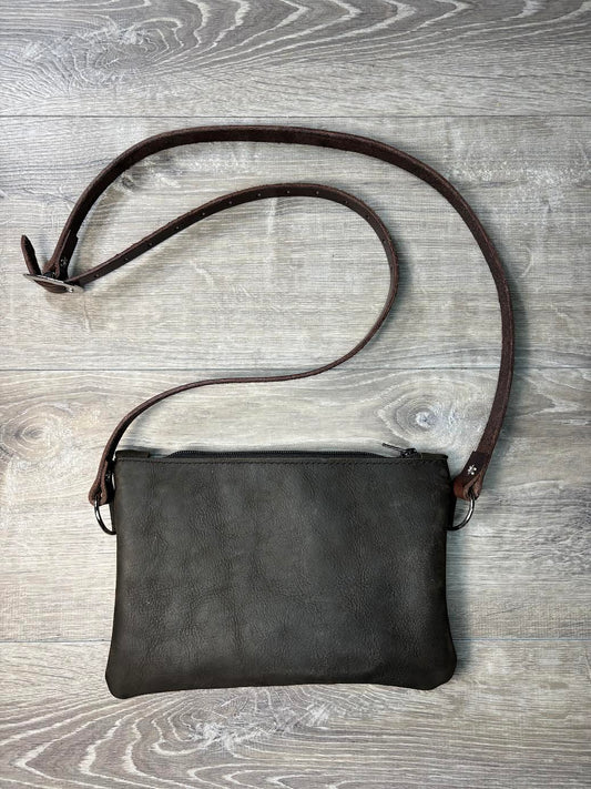 Black and white hair on hide clutch