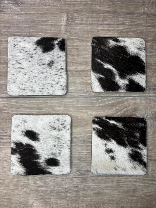 4 pack coasters - black/white hair on hide - patterns may vary