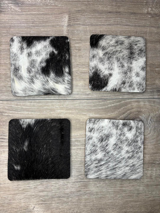 4 pack coasters - black/white hair on hide - patterns may vary