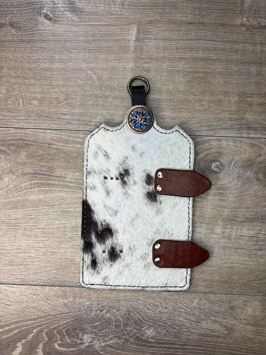 Trophy buckle display black and white hair on hide and blue stone flower copper concho