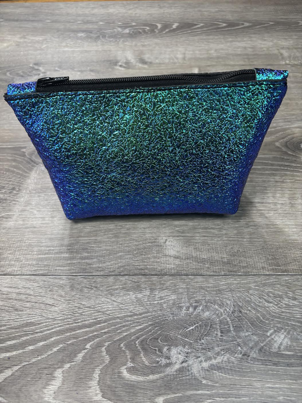 Cosmetic bag shattered transition