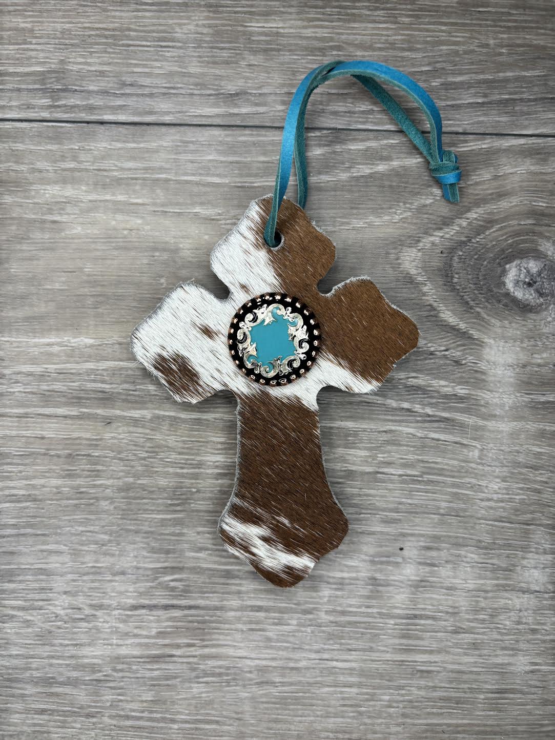 Saddle Cross - Brown/White hide,  Turquoise/silver/black concho