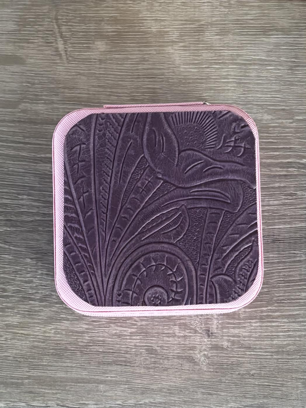 Jewelry box with purple tooled