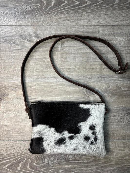 Black and white hair on hide clutch