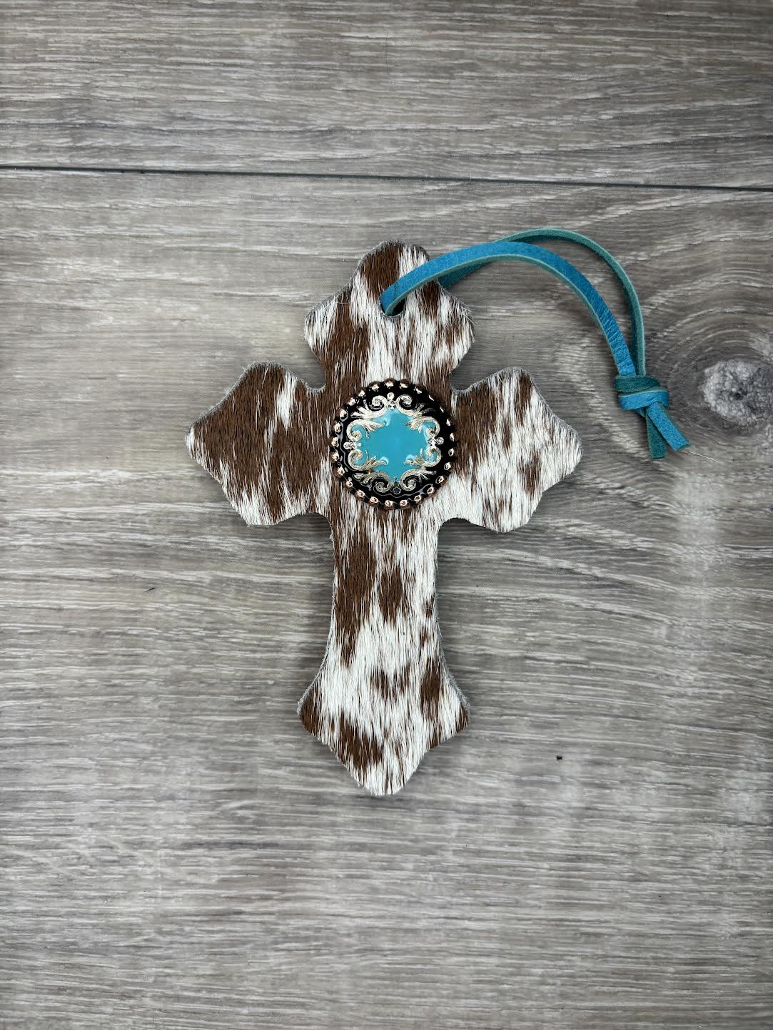 Saddle Cross - Brown/White hide,  Turquoise/silver/black concho