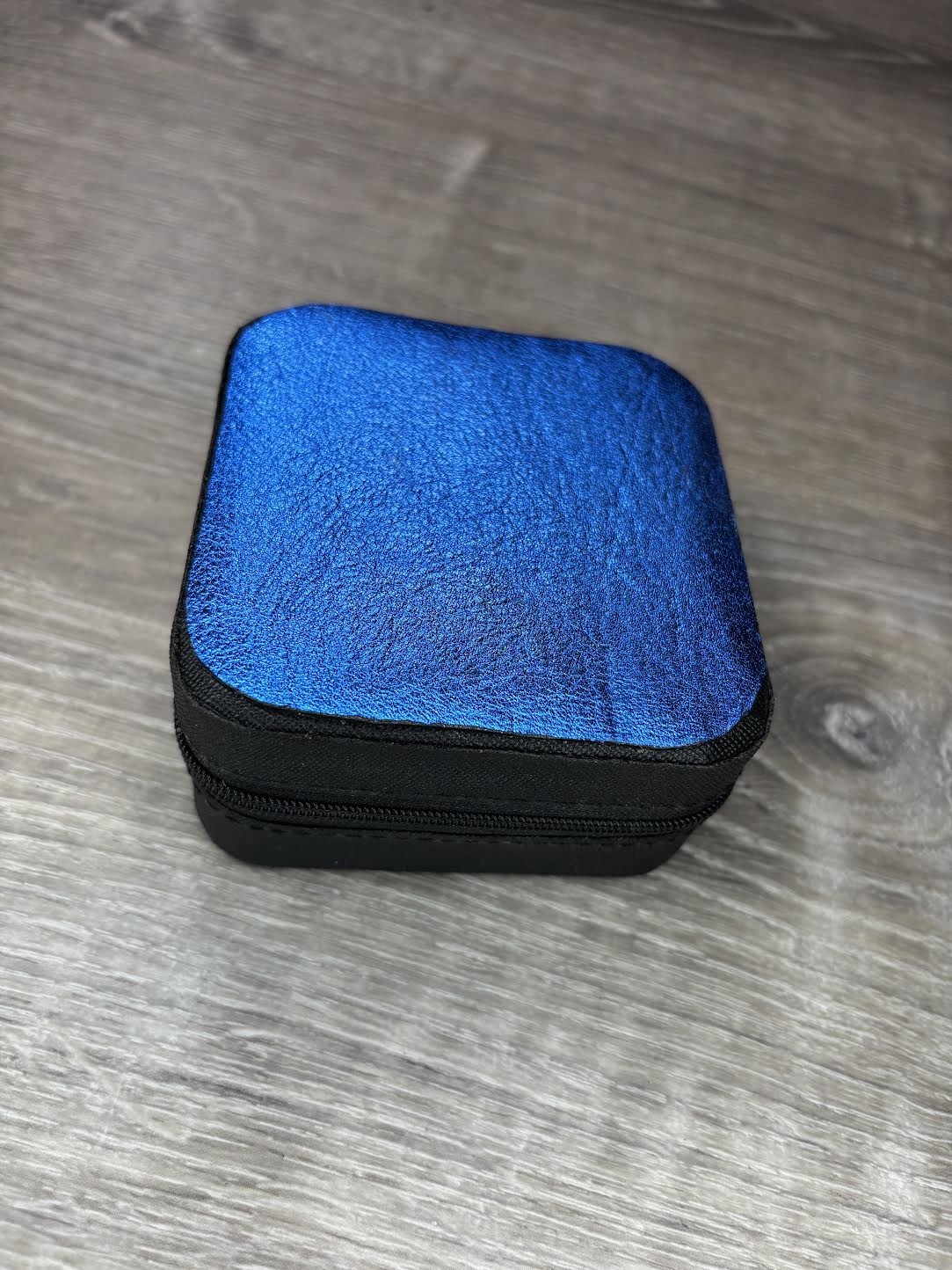 Jewelry box with metallic blue